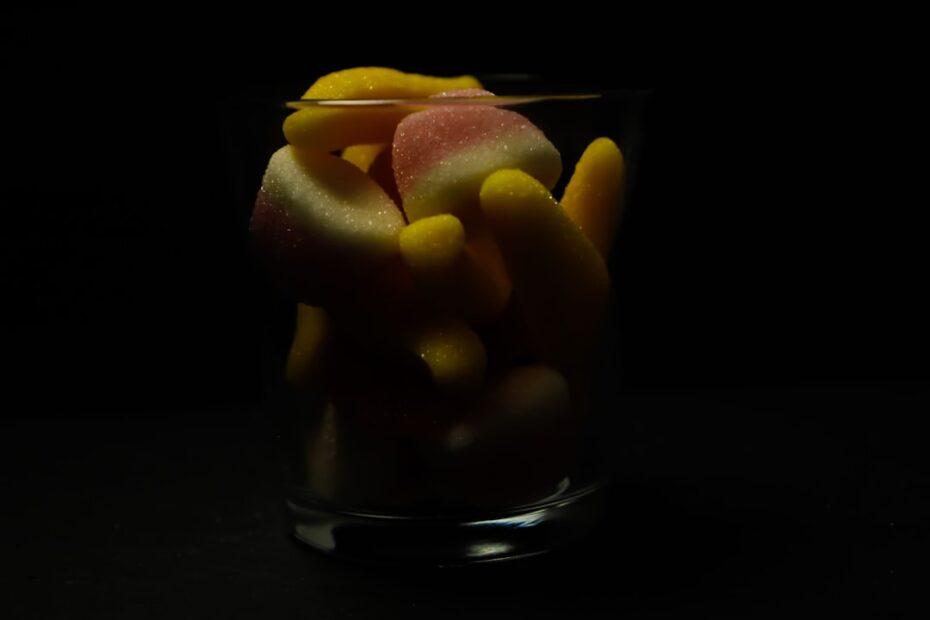 A person holding a pill bottle, surrounded by various-sized pills, symbolizing the complexities of tapering antidepressants.